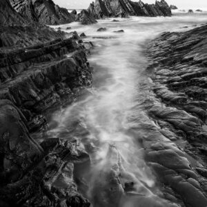 Black and white seascape photo of Hartland, bideford, Devon, UK.