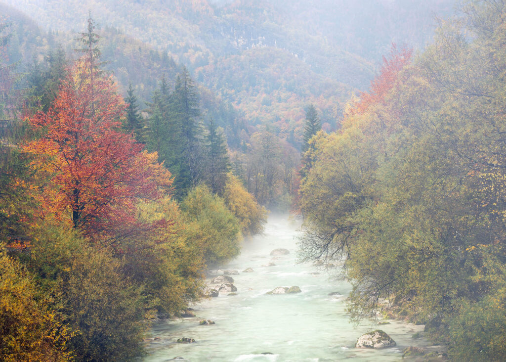 Soca River on a misty autumn morning in Slovenia. Buy fine art photography prints.