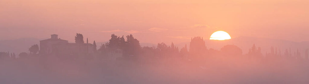 Misty sunrise at San Gimignano in Tuscany, Italy. Buy a fine art print online.