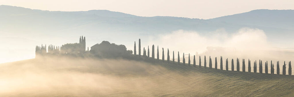 Poggio Covili on a misty morning in Tuscany, Italy. Buy a fine art print online.