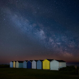 Beach Huts at night, South Downs National Park, England.