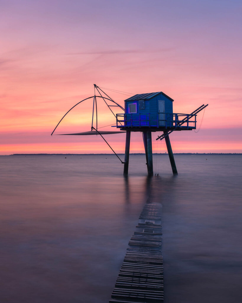 Fishing Huts at Dusk in Brittany, France.